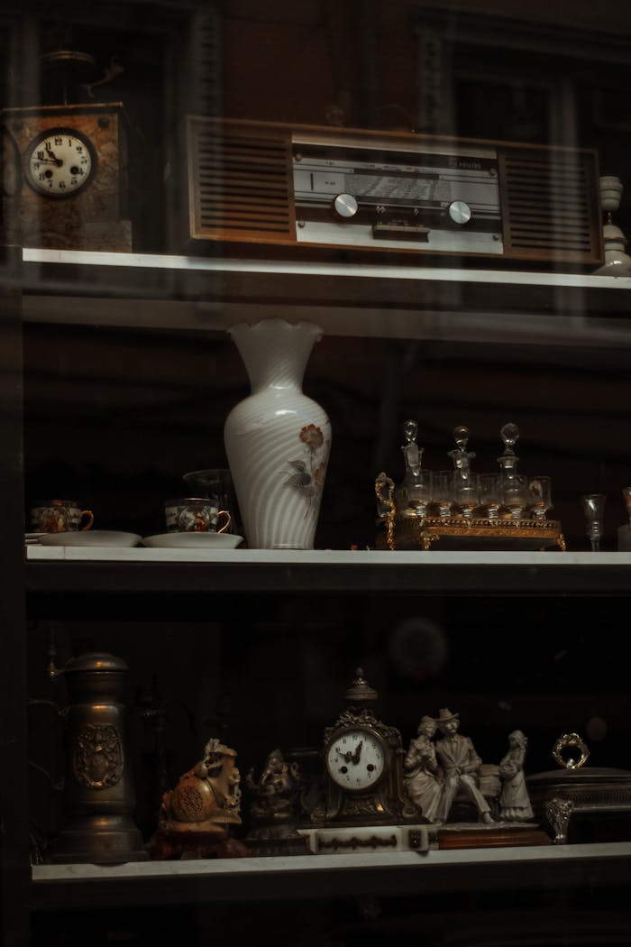 Discover a rustic collection of vintage items on display in an Istanbul antique shop shelf.